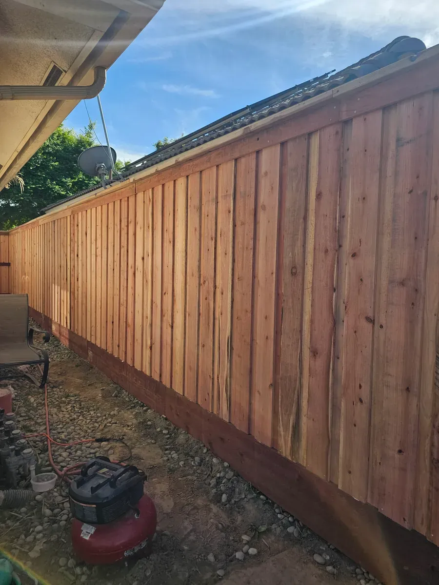 Wood fence with tightly set boards in Fresno, California