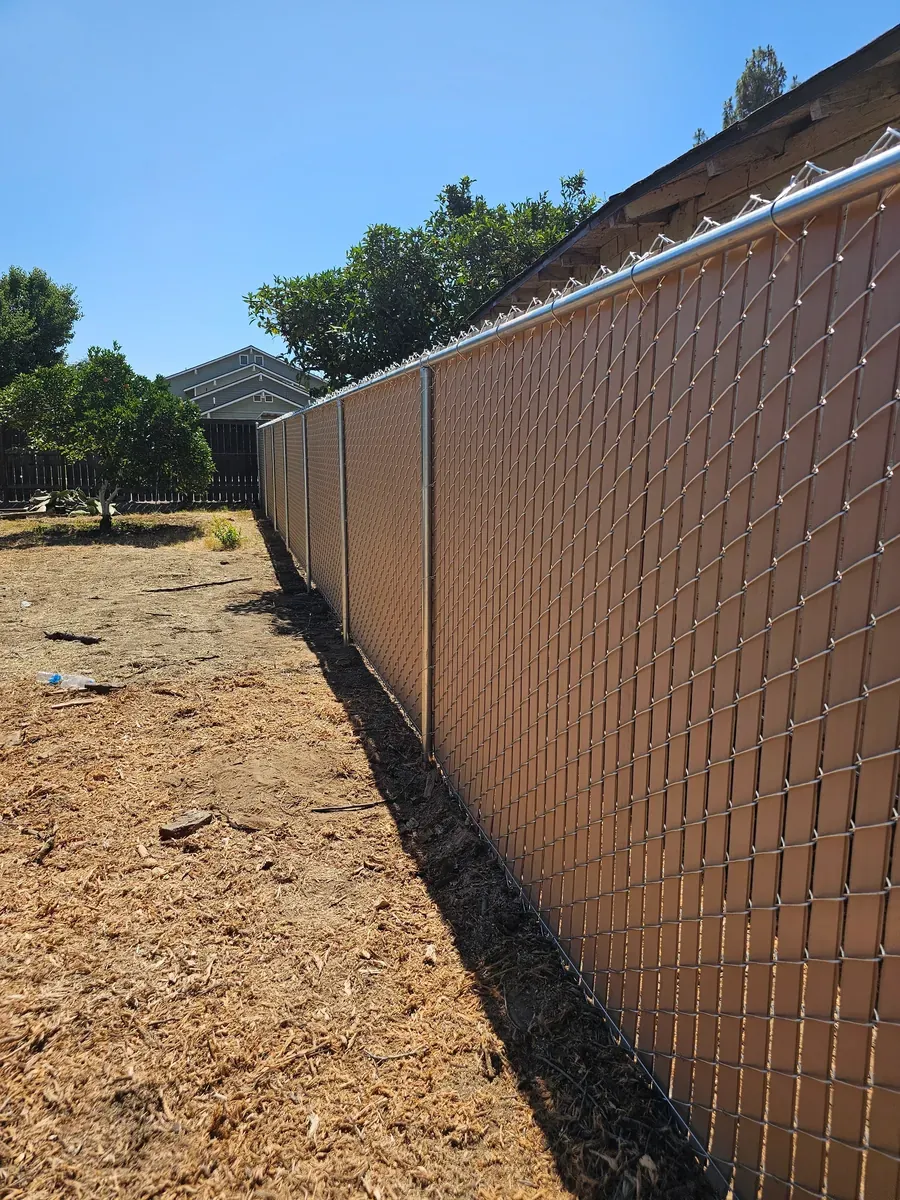 Chain link fence with privacy slats in Fresno, California