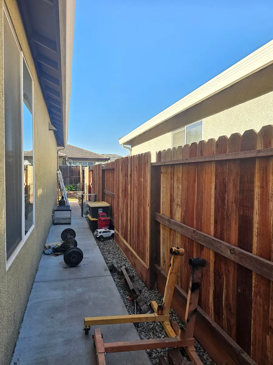 Fence along a narrow side yard in Fresno, California