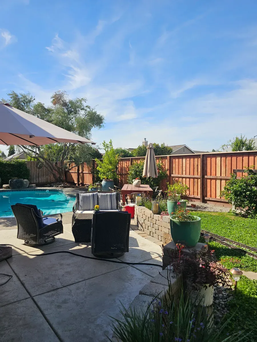 Wood fence around a pool yard in Fresno, California