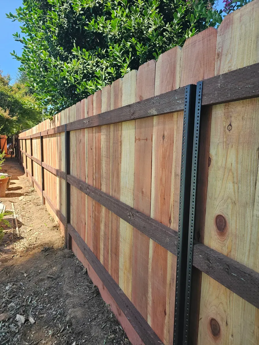 Framed fence with steel posts and rails in Fresno, California